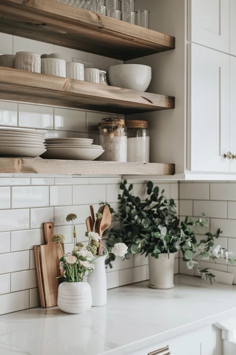 Exploring the top kitchen tile ideas that perfectly pair with white cabinets, enhancing style and functionality. This pin showcases ideal tiles for creating a beautiful kitchen. Farmhouse White Backsplash Kitchen, Kitchen Shelves Above Cabinets, White Kitchen With Shelves Ideas, Kitchen Ideas White Cabinets Dark Floors, Two Tone Backsplash Kitchen, Backsplash Black And White Kitchen, Kitchen Tiles Inspiration, Kitchen White Cabinets Backsplash, Kitchen Design With White Cabinets