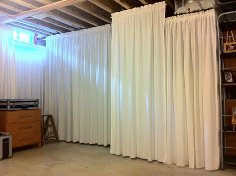 AFTER: Main area of our unfinished basement                                    behind those curtains is the laundry area       oh yeah, tha... Basement Curtains, Unfinished Basement Walls, Basement Room, Basement Playroom, Basement Laundry, Basement Floor, Diy Basement, Basement Windows, Basement Storage