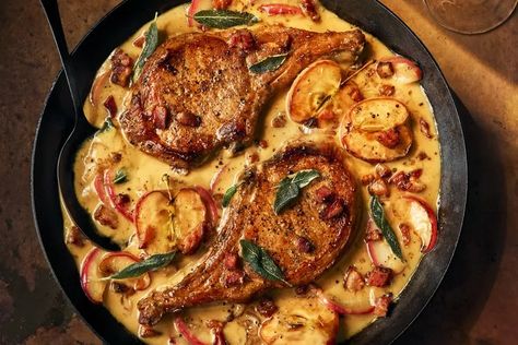 30 Hearty Fall Dinner Ideas Pork Chops With Apples And Bacon Food And Wine, Pork Chops With Apples And Bacon, Autumn Pork Recipes, Pork Chop Apple Recipes, Fall Pork Chops, Pork Chops And Apples Recipes, Pork And Apple Recipes, Fall Pork Chop Recipes, Pork Chop With Apples