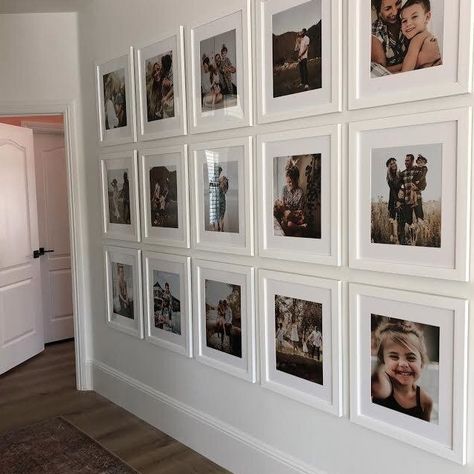 White Photo Frames On The Wall, Family Photo Wall White Frames, Picture Wall White Frames, White Frame Wall Gallery, White Frame White Wall, White Framed Photos On Wall, White Picture Frame Gallery Wall, 12 X 16 Picture Frame On Wall, White Framed Gallery Wall