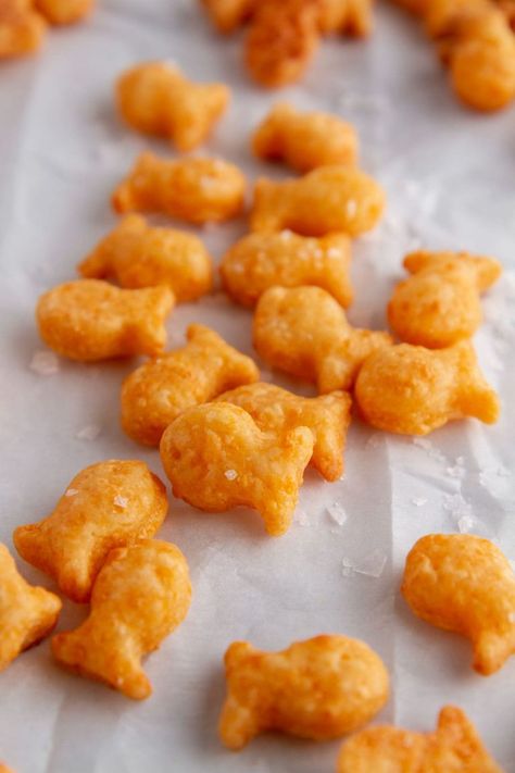 Homemade Goldfish Crackers Recipe | Girl Vs Dough Homemade Gold Fish Recipe, Diy Goldfish Crackers, Goldfish Snack Mix Recipes, Goldfish Crackers Recipe, Homemade Goldfish, Homemade Goldfish Crackers, Homemade Staples, Homemade Cheese Crackers, Snack Crackers