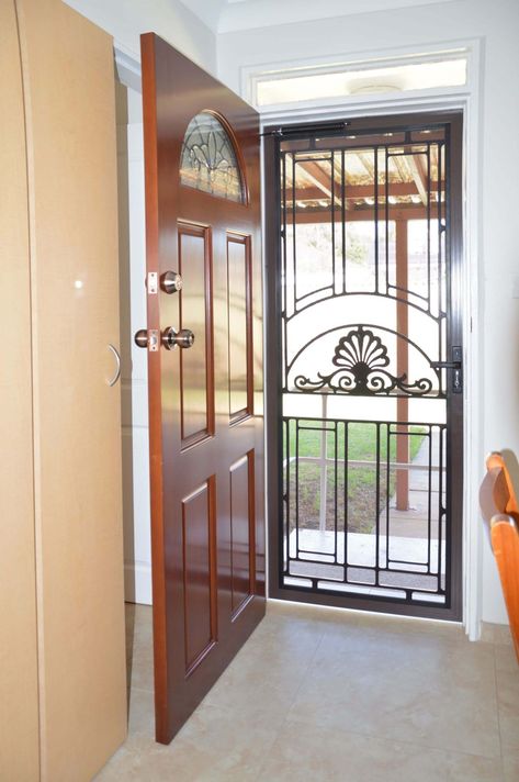 Doors Plus-External-Entrance-Nubreeze-Safety screen hinged door-with grill design on it-in black finish Safety Door Design Entrance Metal, Safety Door Design Entrance Grill, Safety Door Design Entrance, Safety Door Design, Door Design Entrance, Sliding Screen Door, Net Door, Stacking Doors, Door Grill