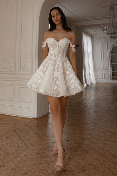 Embrace luxury with our short wedding dress. Its 3D floral lace and shimmering fabric add elegance, while detachable straps offer versatile styling with a princess vibe. Perfect for your reception. Important info: depending on the size, the layout of the lace may change slightly while maintaining the original design. Since it is handmade, some lace elements can be replaced or shifted, while keeping the original lace; the width of the lacing area on the back of the wedding dress can range from 1" After Party Wedding Dress, After Party Wedding, 2 In 1 Wedding Dress, Floral Lace Wedding Dress, Party Wedding Dress, Detachable Skirt, Wedding After Party, Wedding Reception Dress, Princess Wedding Dress