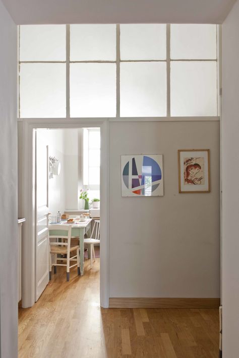 The passage into the kitchen, where architectural glass forms the top half of the dividing wall. Roman Kitchen, Borrowed Light, Glass Room Divider, Half Walls, Boss Office, Room Divider Walls, Glass Room, Clerestory Windows, Glass Doors Interior