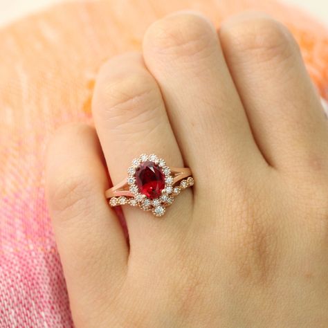 oval ruby vintage halo engagement ring rose gold split shank band by la more design Vintage Halo Engagement Ring, Ruby Ring Set, Matching Ring Set, Halo Bridal Set, Ruby Wedding Rings, Diamond Bridal Ring Sets, Vintage Halo, Engagement Rings Vintage Halo, Hand Rings