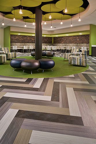 Bright pops of green floor covering enliven this corporate office space and add texture to the floor plane. Office Space Corporate, Corporate Office Design, Green Office, Garden Canopy, Office Space Design, Corporate Interiors, Green Flooring, Workplace Design, Loft Design