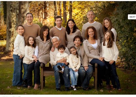 A suggested 'do' on how to dress for an extended or any size family group photo. This mix of neutrals: tans, off whites and light wash jeans keeps the focus on the family. Family Of 13 Picture Poses, Extended Family Pictures Neutrals, Group Photos Family, Family Of 11 Photo Shoot, Family Photos In Vineyard, 12 Person Family Photos, Family Photos With Bench, Multiple Generation Family Pictures, Family Of 11 Picture Poses