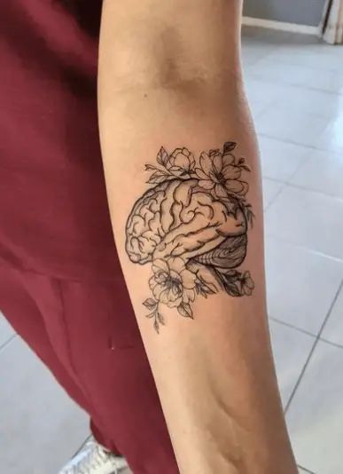 20 Best Brain Tattoo Design Ideas & Meaning in 2023 - Tattoo Twist Flower Brain Tattoos, Brain Tattoo Design, Spoonie Tattoo, Rare Tattoos, Survivor Tattoo, Brain Tattoo, Latest Tattoo Design, Bookish Tattoos, Nurse Tattoo