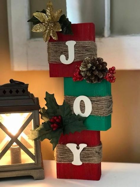 100+ DIY Dollar Tree Christmas Crafts that spells out Love, Hope & JOY - Hike n Dip Wooden Joy Sign Diy Christmas Wood Blocks, Christmas Decor Ideas Diy To Sell, Diy Wood Presents Decor, Scrap 2x4 Projects Diy Christmas, Jenga Block Crafts Diy Dollar Tree Truck, Diy Christmas Decorations For Office Desk, Christmas 2 X 4 Crafts, Simple Diy Home Decor Ideas Creative, Christmas Crafts With Wood Scraps