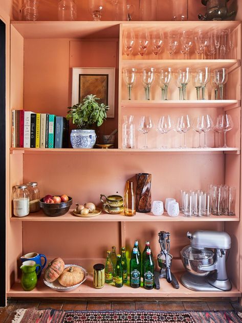 EJ and Whit Brown's Alabama Cabin Pantry Peach Paint Colors, Dark Brown Walls, Peach Kitchen, Round Wooden Coffee Table, Peach Paint, Cabin Renovation, Ceiling Shelves, Brown Walls, Modern Cabin