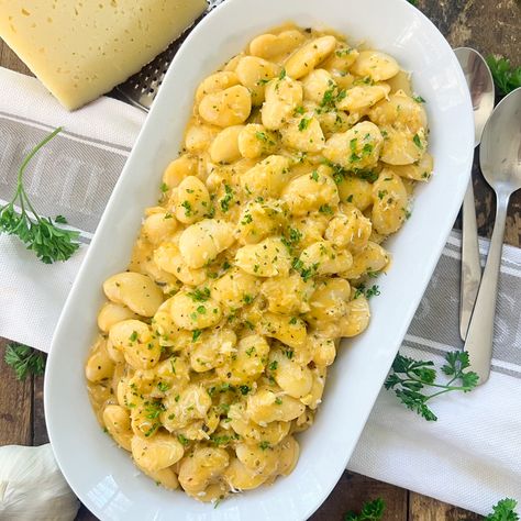 "These Creamy GARLIC Butter Beans are filled with flavors, made with simple ingredients and done in about 20 minutes. Serve them as a side dish next to some grilled fish or even as a main course next to a crunchy baguette. Either way, it’s the kind of food that’ll fill you with so much goodness. To make this recipe, I used canned butter beans. If you can’t find butter beans in your area, you can use other types of white beans. Such as great northern or even cannellini beans. You can also Northern White Beans Recipes, Garlic Flatbread Recipe, Garlic Flatbread, Butter Beans Recipe, Beans Recipes, Canned Butter, Potato Fritters, Onion Sauce, Healthy Sandwiches