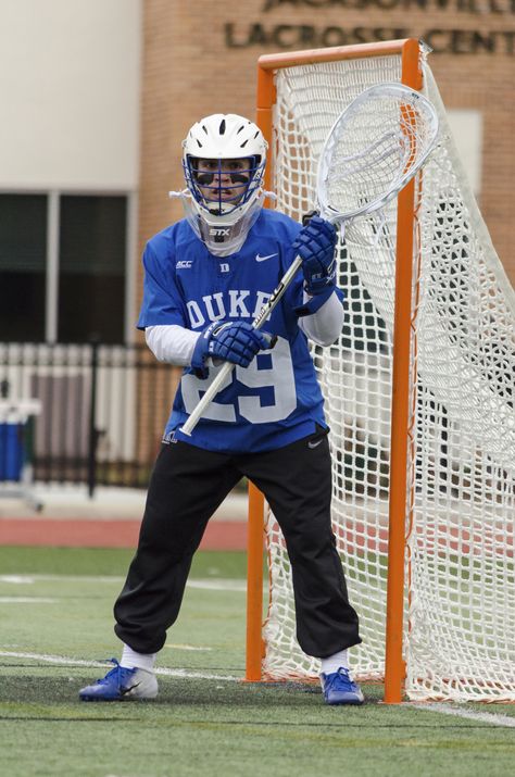 Duke goalie Turner Uppgren of Minnesota in action against Jacksonville. College Lacrosse, Lacrosse Goalie, Starship Concept, Guinness, Lacrosse, Football Helmets, Division, Minnesota, Quick Saves