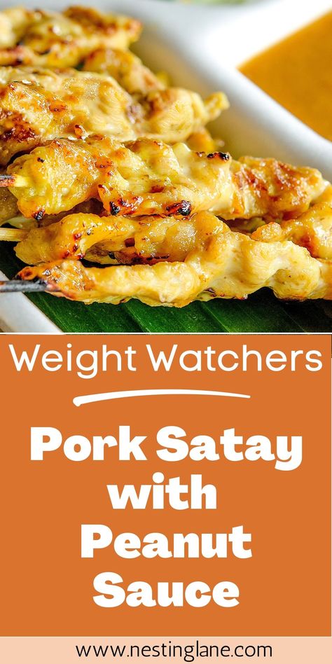 This Weight Watchers Pork Satay with Peanut Sauce recipe is a delicious and healthy way to satisfy your cravings. Tender pork tenderloin strips are marinated in a savory blend of soy sauce, brown sugar, and peanut butter before being skewered and broiled to perfection. The result is a mouth-watering dish that's high in protein and low in Points. The peanut dipping sauce, made with ginger, lime juice, and garlic, adds an flavor. This recipe is perfect for a weeknight dinner or weekend barbecue. Tender Pork Tenderloin, Satay Sauce Recipe, Pork Satay, Peanut Dipping Sauce, Pork Sauce, Healthy Pork, Peanut Sauce Recipe, Satay Sauce, Healthy Family Dinners