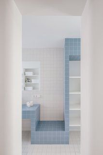 I thought this was interesting for kids room bathroom. White Shelving Unit, Timber Slats, Sliding Wall, Timber Roof, White Wall Tiles, White Kitchen Island, Black Toilet, Pink Bathroom, Blue Tiles