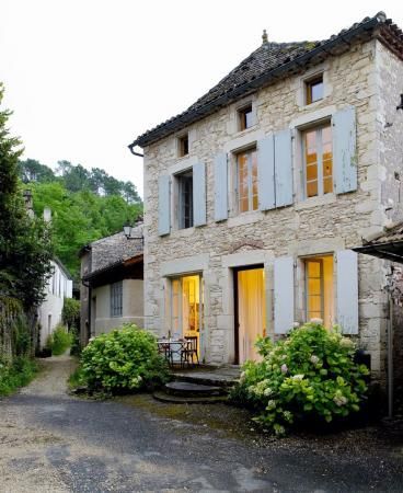 Breathtaking front facade of #Frenchfarmhouse with #blueshutters and limestone on Hello Lovely Studio House With Shutters, French Stone House, European Cottage, French Exterior, French Farmhouse Decor, European Farmhouse, Country Cottage Decor, Cottage Exterior, French Property