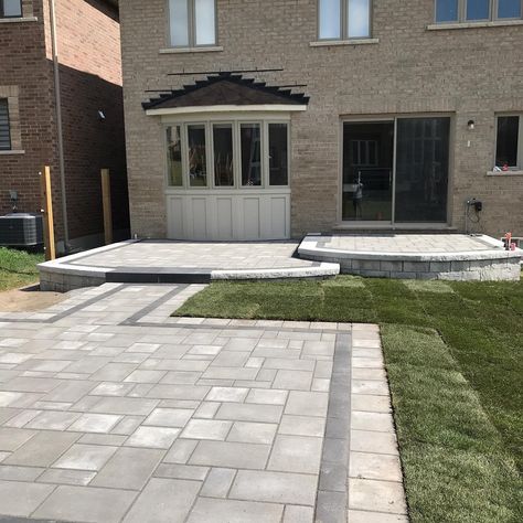 Unilock Pavers Patio, Interlocking Pavers Design, Gray Brick Patio, Modern Brick Patio, Patio Brick Design, Interlocking Bricks Landscaping, Patio Pavers Design Layout Brick Patterns, Backyard Interlocking Ideas, Patio Brick Ideas