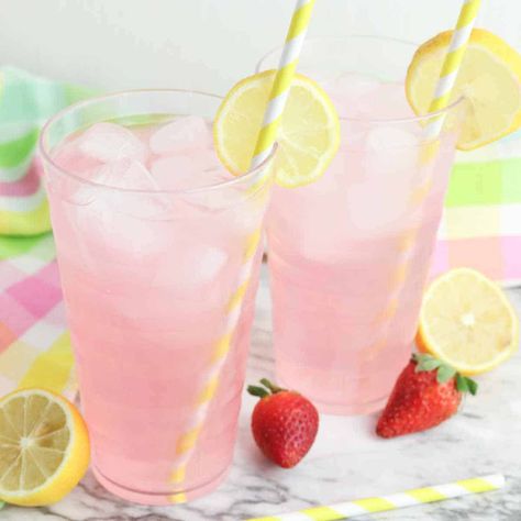 Tall glasses of strawberry lemonade. Pretty Lemonade Drinks, Pink Lemonade With Strawberries, Strawberry Lemonade Aesthetic, Pink Lemonade Aesthetic, Pink Lemonade Mocktail Recipe, Nichole Daniels, Lemonade Spritzer, Sparkly Pink Lemonade, Drinks With Sprite