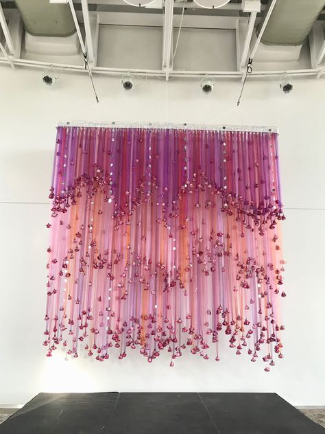 #floralwallhanging #floraltulleribbonwallhanging #tulleribbonfloralchandelier #ribbonchandelier #tulle #ribbon #floralchandelier #hangingflowers #flowerchandelier #ceilingflowers #outdoorchandelier #floralfantasy #hangingflowers #ceilingfloral #lightedfloralchandelier #chandelier #ceilingfloralchandelier #floralchandelierwedding #receptiondecor #weddingreceptiondecor #weddinginspiration #wedding #weddingdecorations #lanafaulkerfloraldesign #fairbanksflorist #downtownbridalstroll Tulle Chandelier, Flower Ceiling Diy, Streamer Chandelier, Ribbon Installation, Roses For Wedding, Ribbon Chandelier, Ribbon Backdrop, Tulle Backdrop, Tulle Ribbon