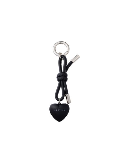 Editor's Notes J.ESTINA's accessory is classy and sophisticated for daily wear.- Engraved brand logo point- Can be a key ring or multi charm decoration- Bold heart pendant and trendy ribbon knots are well mixed- Easy to attach and detach with O-ringMeasurements(in.)- Size: 1.38 in. * 5.91 in.- Heart: 1.38 in. * 1.38 in. Composition & Care- CCB, Synthetic Leather, Metal- Plated products may discolor over time- Be cautious when using wet tissues, alcohol, and cosmetics- Since si J Letter, Heart Ribbon, Accessory Inspo, Leather Jewels, Phone Charm, Synthetic Leather, Key Ring, Key Rings, Heart Pendant