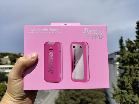 HMD Barbie Flip Phone Announced Globally HMD Global has launched the Barbie Phone, a retro flip phone in partnership with MATTEL. It has a screen on the front that can be used as a mirror & the nostalgic SNAKE game. The device also comes with hidden Easter eggs for key Barbie dates & words, typing BARBIE by pressing *#227243# gets you Barbie wallpapers, *#ken# or *#536# for greetings from Ken and *#malibu# for Malibu beach sounds. The phone comes with two replaceable back covers. The UI f... Barbie Flip Phone, Retro Flip Phone, Barbie Phone, Snake Game, Malibu Beach, Malibu Beaches, Flip Phone, Flip Phones, Easter Eggs