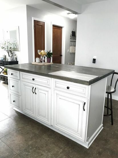 When we bought our first home our kitchen looked like this.. Needless to say that we needed it to be a bit more modern, but also we definitely needed more cabinet space. We had a Home Depot cabinet consultant come over to give us a quote and it was about $1500 for a few updates and an island so... hmmmm. No! We started the process of looking at islands made out of kitchen cabinets and didn’t find much, we got some old cabinets from Facebook marketplace. We had trouble levelin… Small Kitchen Island The Home Depot, Kitchen No Cabinet Doors, Prefab Kitchen Island, Making A Kitchen Island From Cabinets, Building An Island With Stock Cabinets, Kitchen Island Out Of Cabinets, How To Build A Kitchen Island, Diy Kitchen Island From Cabinets, Kitchen Island Using Stock Cabinets