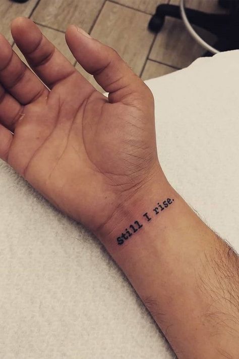 Tattoo that reads, ‘still
i rise.’ Rise Tattoo Ideas, Still I Rise Tattoo Ideas, I Rise Tattoo, Still I Rise Tattoo, Rise Tattoo, Resilience Tattoo, Meaningful Tattoos For Men, Motivational Tattoos, Tatuagem Masculina Pequena