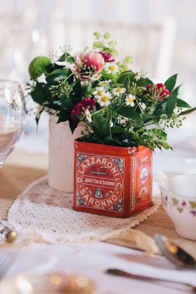 Wildflowers in a vintage D. Lazzaroni tin.   Photography: Heather For Brighton Photo - www.brighton-photo.com/ Tin Photography, Diy Centerpiece, Cheap Backyard, Floral Bridesmaid Dresses, Floral Bridesmaid, Refined Wedding, Tea Tins, England Wedding, Whimsical Wedding