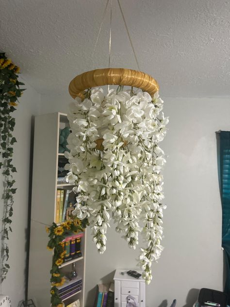 Foam chandelier decorated with faux wisteria flowers and disc lights attached to the lower tier with remote control to light including. Faux Flower Chandelier, Wisteria Chandelier, Diy Flower Chandelier, Decorated Chandelier, Flower Chandelier Light, Decorate Chandelier, Room Reference, Flowers Chandelier, Flat Bedroom