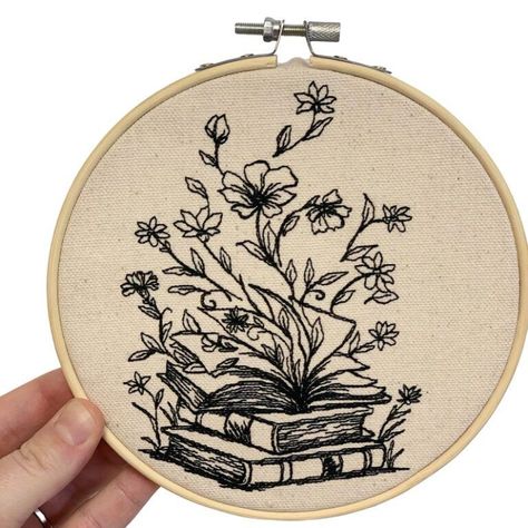 The Best Bookish Spring Decor for a Cheerful Space | Book Riot White And Black Embroidery, Black And White Flower Embroidery, Black And White Embroidery Design, White On Black Embroidery, Embroidery Designs On Black, Toucan Embroidery, Reading Embroidery, Phone Embroidery, Book Embroidery Pattern