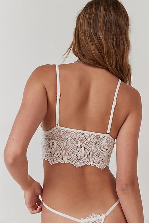 Delicate Battenberg lace tops this Out From Under wireless bralette with sheer lace detailing. Exclusively at Urban Outfitters. Features Out From Under Battenberg lace bralette Lacey wireless bralette Plunge v-neck Sheer lace back Adjustable straps UO exclusive Content + Care 90% Cotton, 10% spandex Machine wash Imported Size + Fit Model in White is 5'10.5" and wearing size Small Measurements taken from size Small Chest: 26" | Out From Under Battenberg Lace Bralette in White, Women's at Urban Outfitters White Lace Delicate Bra, Low-cut Lace Closure Bra, Feminine Delicate Lace Low-cut Bra, Beach-ready Bra-friendly Lace Crop Top, Battenberg Lace, Cheap Lace Bra-friendly Intimates, Men's Shoes Accessories, Women Men Shoes, Lace Back