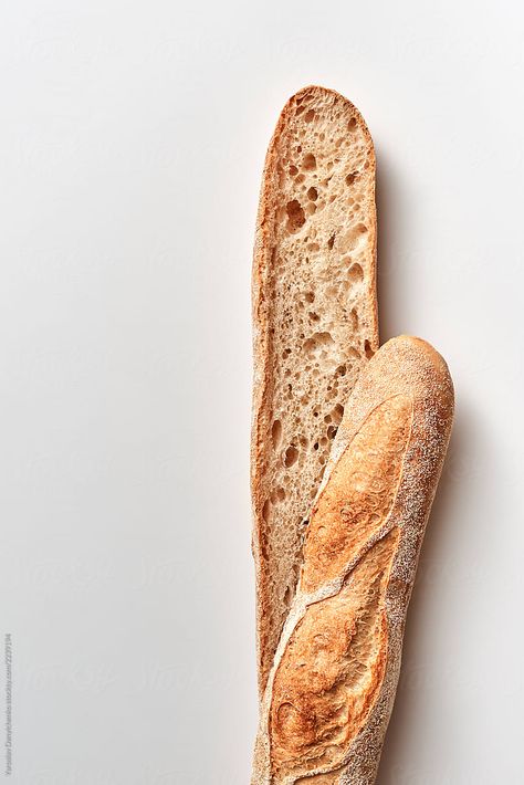 Fresh cut baguette on a gray background with copy space. Healthy food. Flat lay Baguette Photography, Food Flat Lay, Fruit Bread, Fresh Cut, Bagels, Print Ads, Gray Background, Macro Photography, Photo Inspiration