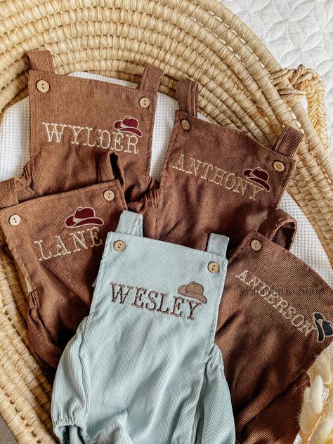 Saddle up for your little cowboy or cowgirl's first birthday with our charming romper overalls, perfect for a "Wild One", "How the West was One", or "My First Rodeo" themed celebration!  This adorable outfit is designed to add a touch of Western flair to their special day. Crafted with soft corduroy fabric, these overalls are both stylish and comfortable for your little one. The cowboy hat embroidery on the chest, accompanied by your little ones name, adds a playful and festive touch, perfect fo First Rodeo Birthday Outfit, Baby Cowboy Outfits, Baby Western Outfit Boy, Cowboy Baby Photoshoot, Cowboy Theme Birthday, First Birthday Boy Rodeo, Baby Boy Cowboy Outfits, First Birthday Outfit Boy, Western Baby Boy Clothes