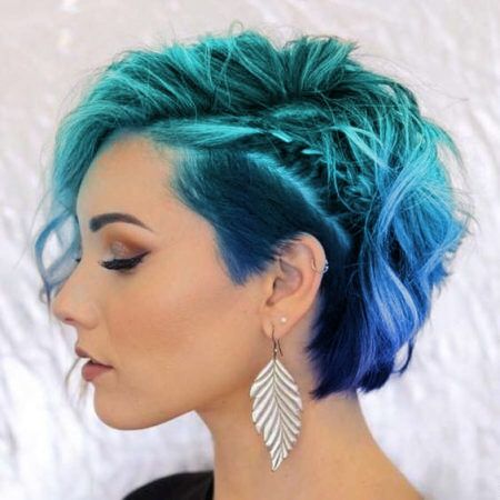 Long Wavy Pixie With Undercut, Asymmetrical Bob Shaved Side, Types Of Mohawks, Medium Length Mohawk For Women, Short Fun Hair Color, Short Wavy Undercut, Fashion Color Pixie Hair, Short Bright Hair, Short Edgy Hairstyle Women Round Face