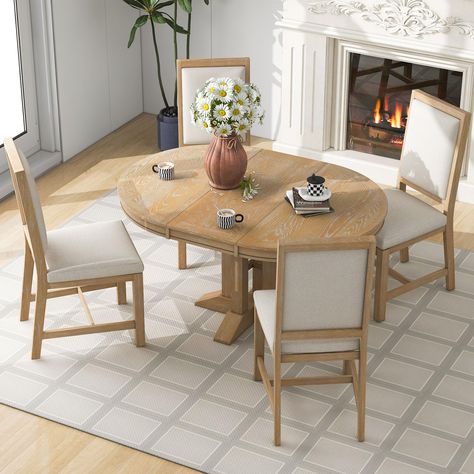 PRICES MAY VARY. 【5-Piece Dining Table Set】5-piece round kitchen table set includes one extendable table and 4 dining chairs for 4.The round dining table with round tabletop,Full of country-chic charm, this beautifully distressed dinnet set makes a stylish statement. 【Extendable Round Dining Table】Round dining table with round tabletop and special curved chair legs is ideal for small place, apartment.One of the characteristics of this table is that it is equipped with beautiful cross-base legs, Essen, Extendable Kitchen Table, Natural Dining Room, Extendable Dining Table Set, Round Extendable Dining Table, Farmhouse Dining Set, Round Dining Table Sets, Wooden Dining Set, Round Dining Set