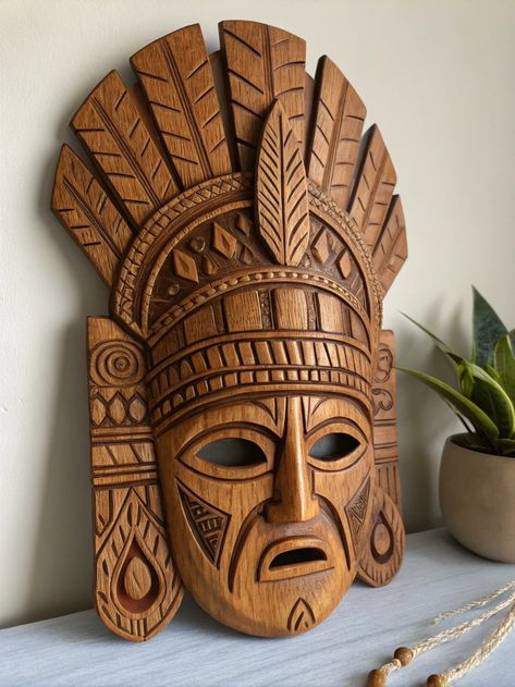 Check out this stunning wooden decorative piece inspired by Native American artistry! The intricate carvings and feather details make it a true masterpiece. What do you think about its unique design? Share your thoughts in the comments! 🪵✨ #WoodworkArt #Craftsmanship . #woodworking #wood #handmade #woodworker #woodwork #diy #design #smallbusiness #interiordesign #woodart #art #homedecor #furniture #wooddesign #carpentry #woodcraft Wooden Home Decor Ideas, Woodwork Diy, Wooden Home Decor, Wooden Home, Masks Art, Woodworking Wood, Wood Design, Carpentry, Diy Design