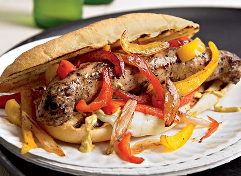 It's time to say goodbye to pork, at least in this sausage sandwich recipe. We swap in chicken or turkey, both of which are leaner, less caloric options. Sausage Lunch Recipes, Chicken Sausage Lunch, Sausage Sandwich Recipes, Grilled Bratwurst, Italian Sausage Sandwich, Sandwich Recipes Indian, Sausage Sandwich, Boiled Chicken Breast, Healthy Sandwich Recipes