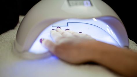 Is UV light for nails safe? UV lamps are used to quickly dry gel polish but how else do they affect the nails and skin? Inside, experts reveal all. Gel Manicure, What Are Acrylic Nails, Premature Wrinkles, Remove Gel Polish, Nail Infection, Gel Pedicure, Gel Manicures, Gel Lamp, Uv Nail Lamp