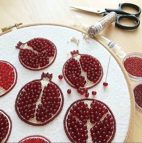 Could not love these juicy embroidered pomegranates from @brooch_garden more!  So simple but so poppy! I've never tried incorporating beading into my embroidery but I'm going to have to give this a go.   I love the contrasting burgundy and maroon.   #pomegranate #persephone #beadembroidery #handmadejewelry Tambour Embroidery, Beads Embroidery, Bead Embroidery Patterns, Hand Work Embroidery, Indian Embroidery, Hand Embroidery Art, Hand Embroidery Stitches, Modern Embroidery, Embroidery Craft