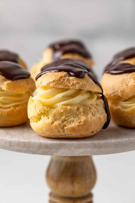 Profiteroles are made from choux pastry baked until puffed and crisp. They are filled with homemade pastry cream and topped with a drizzle of warm ganache. French Cafe Menu, Profiteroles Recipe, Homemade Pastry, Cream Dip, Homemade Pastries, Choux Pastry, Pastry Cream, Cafe Menu, Homemade Caramel