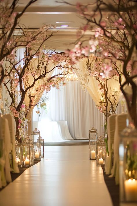 Elegant wedding aisle decorated with blooming cherry blossoms and candlelit lanterns. Rose Petal Wedding Aisle, Wedding Aisle Lanterns, Wedding Aisle Decorations Indoor, Simple Wedding Aisle, Wedding Ceremony Ideas Indoor, Rustic Outdoor Ceremony, Wedding Aisle Ideas, Wedding Aisle Decorations Outdoor, Wedding Aisle Decoration