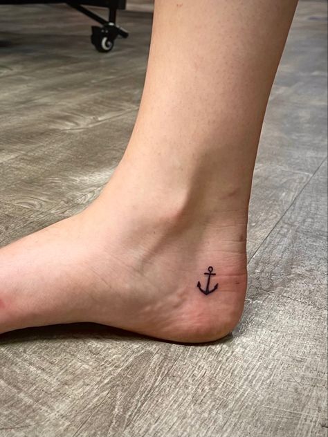 Small simple anchor tattoo on foot Tiny Anchor Tattoos For Women, Minimalist Anchor Tattoo Women, Simple Anchor Tattoo For Women, Anchor Simple Tattoo, Anchor Micro Tattoo, Small Travel Tattoos, Tiny Anchor Tattoo, Anchor Tattoo On Ankle, Simple Anchor Tattoo