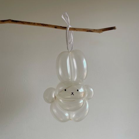 transparent balloon model bunny hanging by a thin white ribbon on an easter treee branch against a white wall Bunny Balloon, March 20, Balloons, On Instagram, Instagram