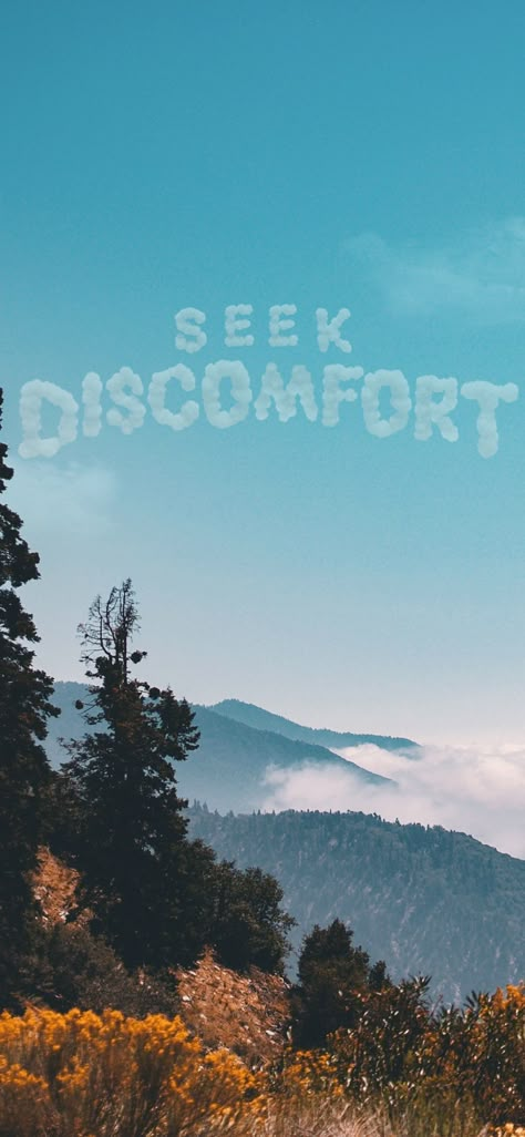 Mountain range with clouds spelling the words Seek Discomfort Ambition Wallpaper Aesthetic, Get Out Of Your Comfort Zone Wallpaper, Discomfort Aesthetic, Seek Discomfort Wallpaper, Comfort Zone Aesthetic, Comfort Zone Wallpaper, Consistency Wallpaper, Homescreen And Lockscreen Wallpaper, Yes Theory