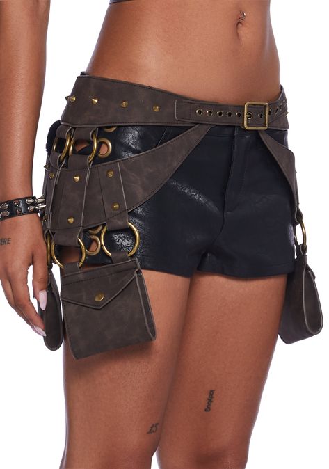 This belt has a vegan leather construction with o-ring hardware, attached pockets with snap button closures, studded detailing, and a front buckle closure.This belt has a vegan leather construction with o-ring hardware, attached pockets with snap button closures, studded detailing, and a front buckle closure. Utility Belt Superhero, Utility Belt Fashion, Utility Belt Concept Art, Sci Fi Belt, Belt With Pockets, Apocalyptic Costume, Post Apocalyptic Costume, Apocalyptic Clothing, Leg Garters