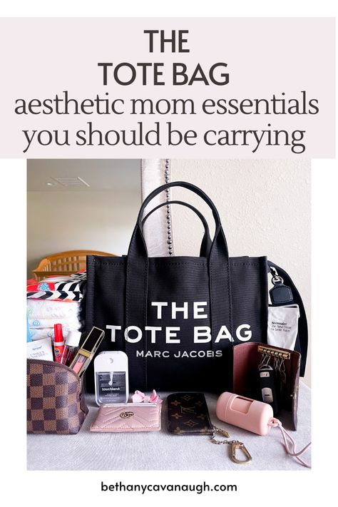 The Tote Bag by Marc Jacobs surrounded by diaper bag essentials, including diapers, wipes dispenser, hand sanitizer, card holder, bag dispenser, key holder, hand lotion, lip gloss, Tide pen, sunscreen. Mom Bags Everyday, The Tote Bag Aesthetic, Mom Purse, Aesthetic Mom, Mom Purses, Mom Essentials, Mom Bag, Tote Bag Aesthetic, Mom Bags