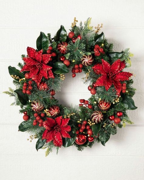 Festive Christmas wreath ideas that look amazing placed on the front door. Homemade Christmas Wreaths, Outdoor Christmas Wreaths, Poinsettia Decor, Large Christmas Wreath, Christmas Wreath Decor, Christmas Wreath Craft, Christmas Wreath Ideas, Christmas Wreaths & Garlands, Poinsettia Wreath