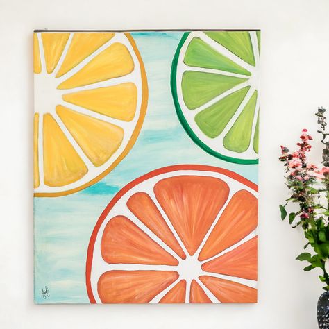 This painting conveys a profound connection between nature and human creativity. With the diversity of their colors, the slices of orange, lime and lemon symbolize the variety and richness of nature and life itself," says Costa Rican artist Jessica Brenes of her spectacular composition. Crafted with acrylics in light blue, white, orange, yellow and green, this remarkable artwork steals the spotlight and imbues any environment with life and vibrancy. Titled La Armonía de los Colores Cítricos in Spanish." Lemon Slice Painting Acrylic, Lemon Slices Painting, Fruit Slices Painting, Orange Acrylic Art, Painting On A Canvas Ideas, Sip And Paint Art Ideas, Acrylic Crayon Art, Orange Slice Painting Easy, 3 Canvas Painting Ideas Easy