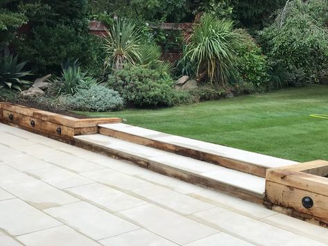 Large porcelain patio, oak sleeper retaining walls and new lawn in Sutton - Modern - Garden - Surrey - by Ayegardening Ltd | Houzz Oak Sleepers Retaining Wall, Sleepers Retaining Wall, Lawn Retaining Wall, Patio And Sleepers, Oak Sleeper Retaining Wall, Sleeper Wall Garden, Railway Sleeper Steps, Sleeper Steps Garden, Sleeper Steps