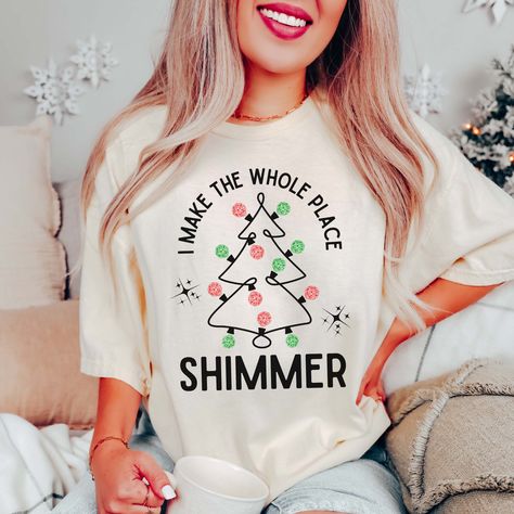 This Whole Place Shimmer Disco Christmas Tee will shine brightly this holiday season! Made with shimmering fabrics and comfort colors, it's the perfect statement piece to sparkle in your winter wardrobe. Put on your dancing shoes and let the lights reflect off of this trend-setting tee! Short Sleeve Sizing: Small - Length 26⅗”, Width 18¼” Medium - Length 28", Width 20¼” Large - Length 29⅖”, Width 22" XL - Length 30¾”, Width 24" 2XL - Length 31⅗”, Width 26” Size Guide: We recommend comparing thes Natal, Tela, Fleece Women, Santa Tee, Womens Christmas Shirts, Comfort Colors Tshirt, Santa Shirts, Merry Christmas Shirts, Shirts Women