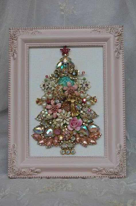 I may have to give this a try with some of my grandmother's old costume sparklies Chic Christmas Decor, Old Jewelry Crafts, Costume Jewelry Crafts, Jeweled Christmas Trees, Shabby Chic Jewelry, Jewelry Frames, Jeweled Christmas, Jewelry Christmas Tree, Vintage Jewelry Crafts